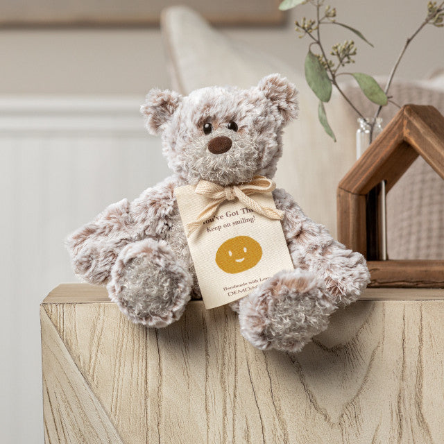 Smiling Mini Giving Bear