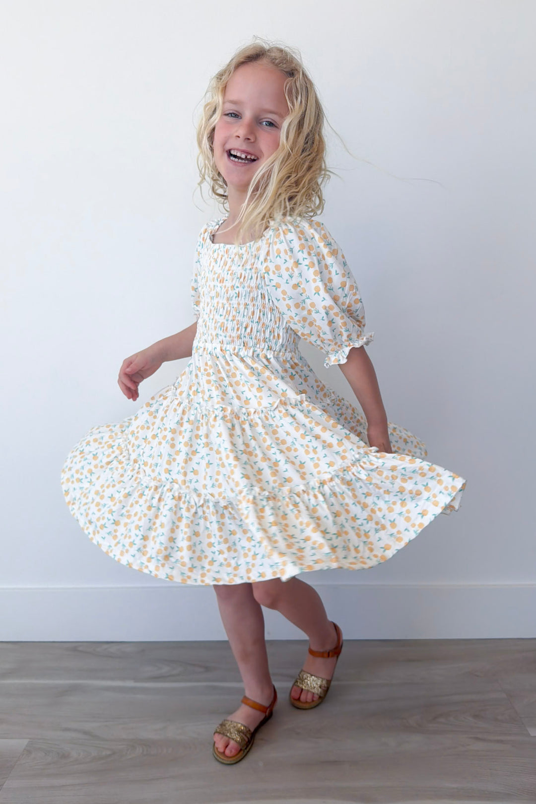 Marvelous Marigolds Girl's Smocked Ruffle Dress