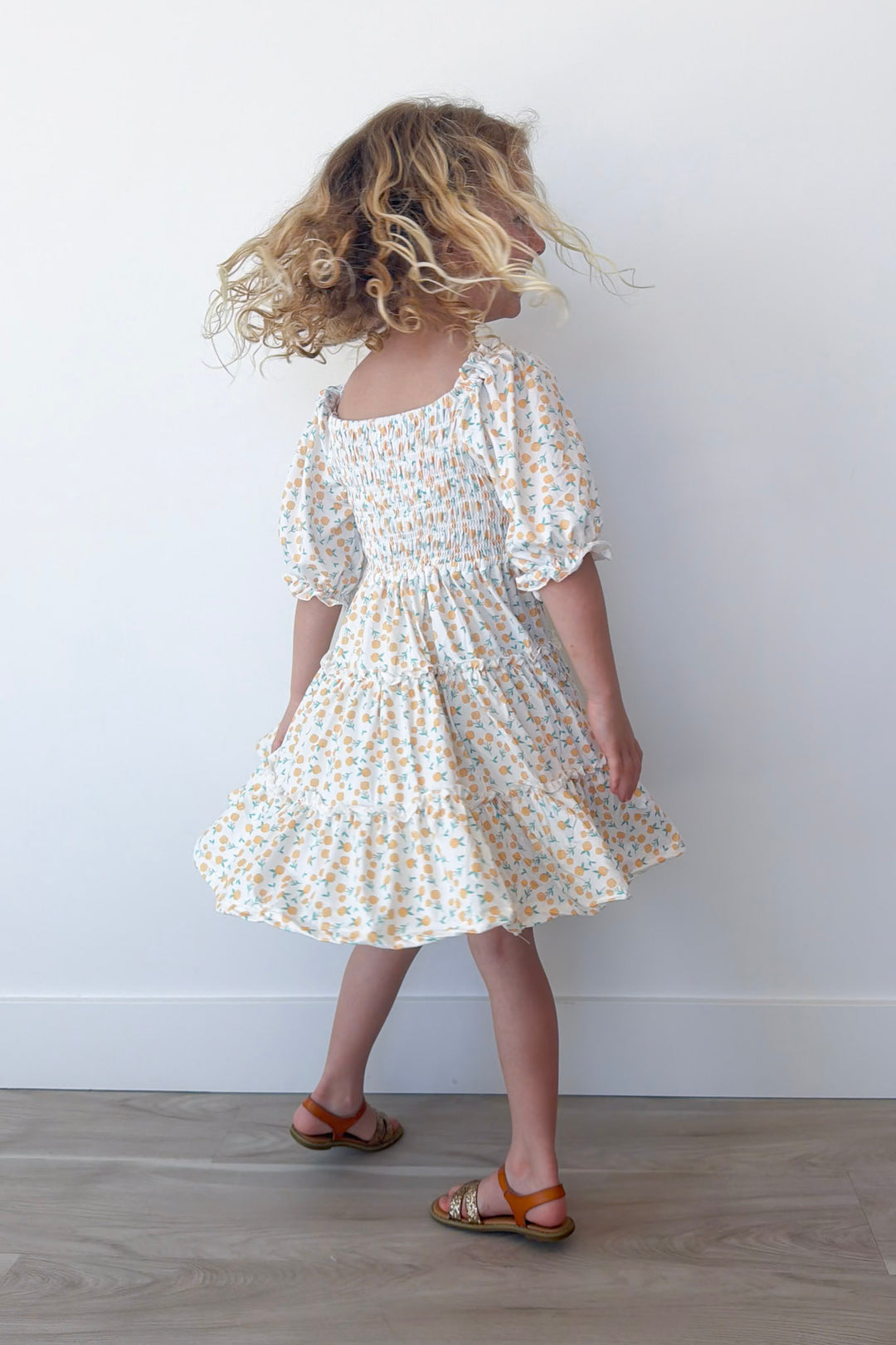 Marvelous Marigolds Girl's Smocked Ruffle Dress