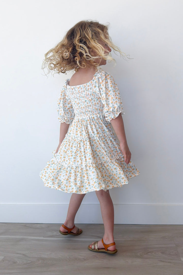 Marvelous Marigolds Girl's Smocked Ruffle Dress