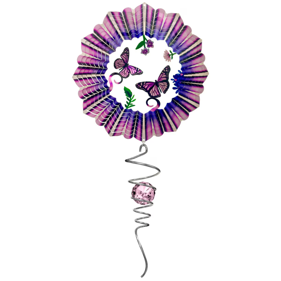 Decorative wind spinner with purple and pink ribbons, butterflies, and flowers on a white background.