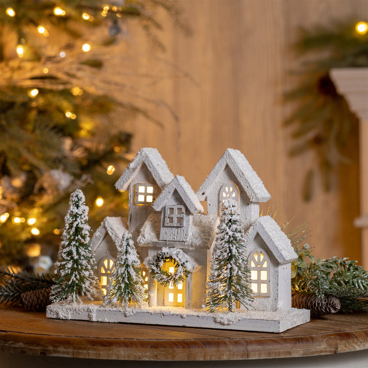 Snowy Countryside Lighted House