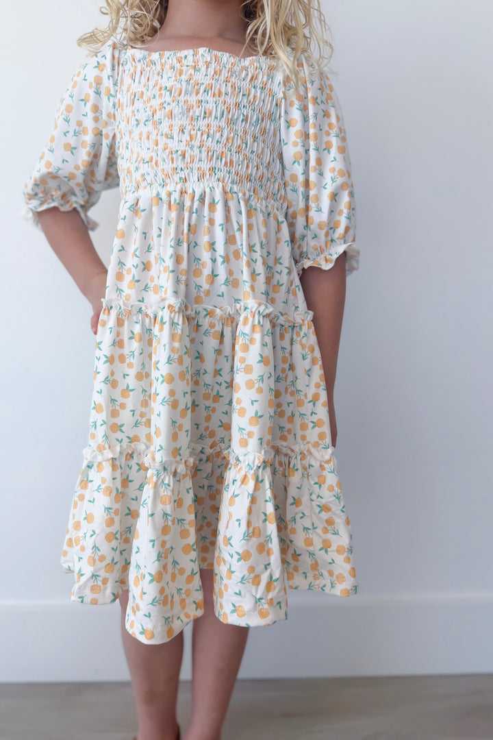 Marvelous Marigolds Girl's Smocked Ruffle Dress