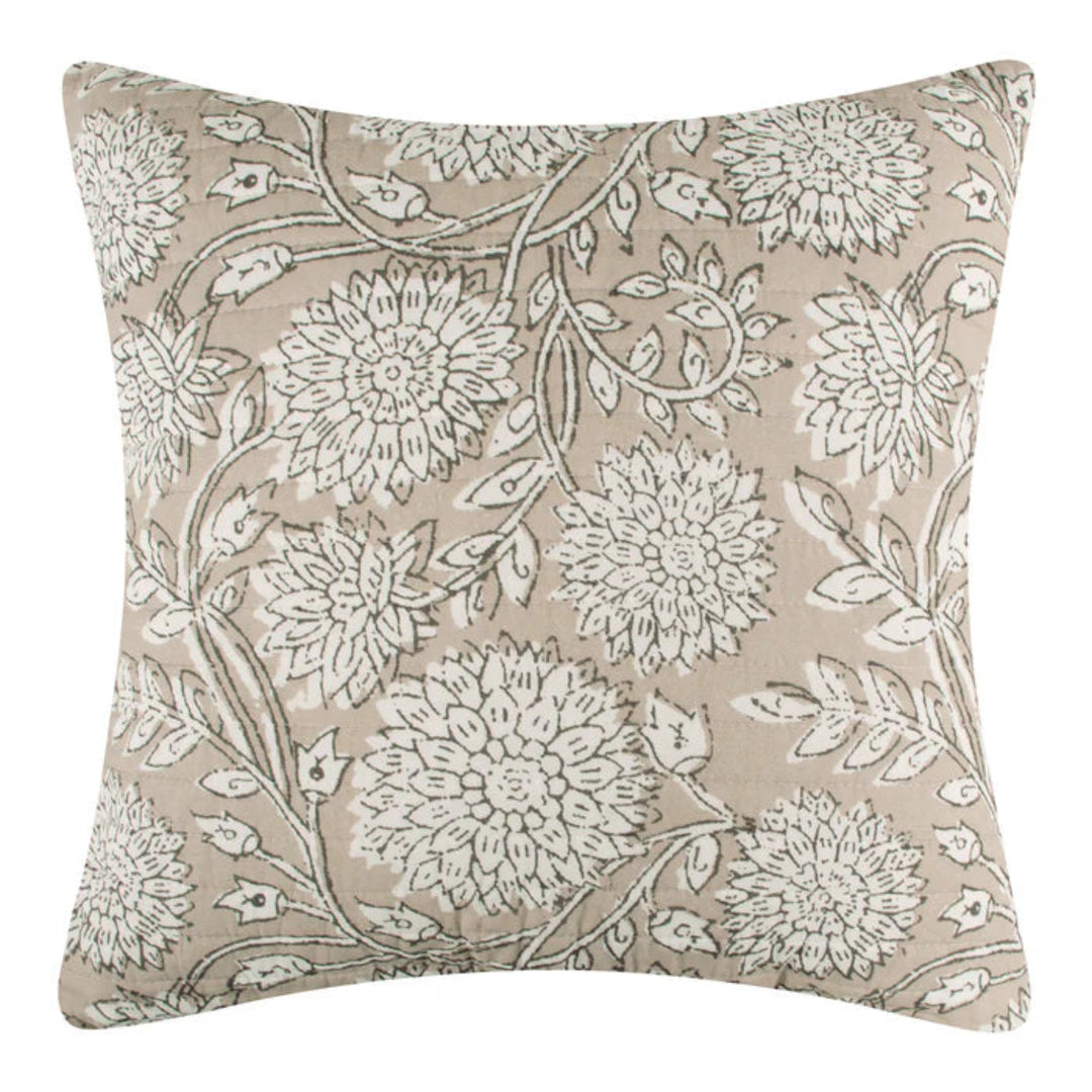 Decorative pillow with floral pattern on a beige background