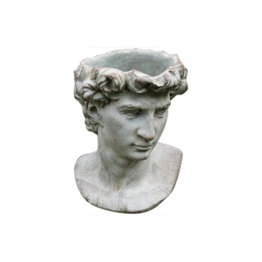 Statue of a classical bust with a white background