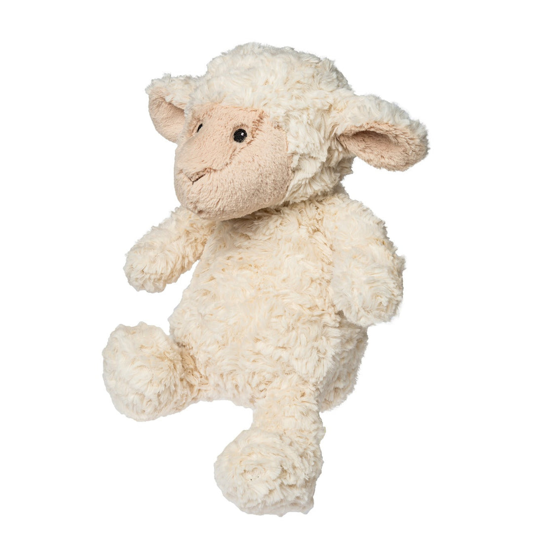 Plush toy sheep on a white background