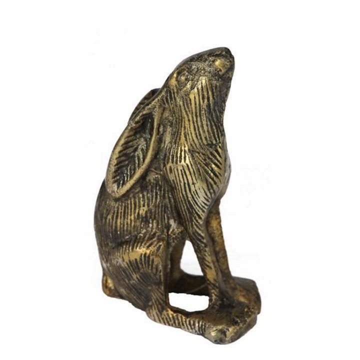 Bronze bear figurine on a white background