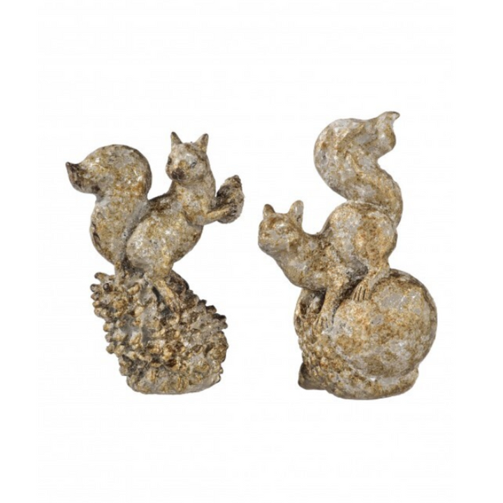 Two decorative squirrel figurines on a white background