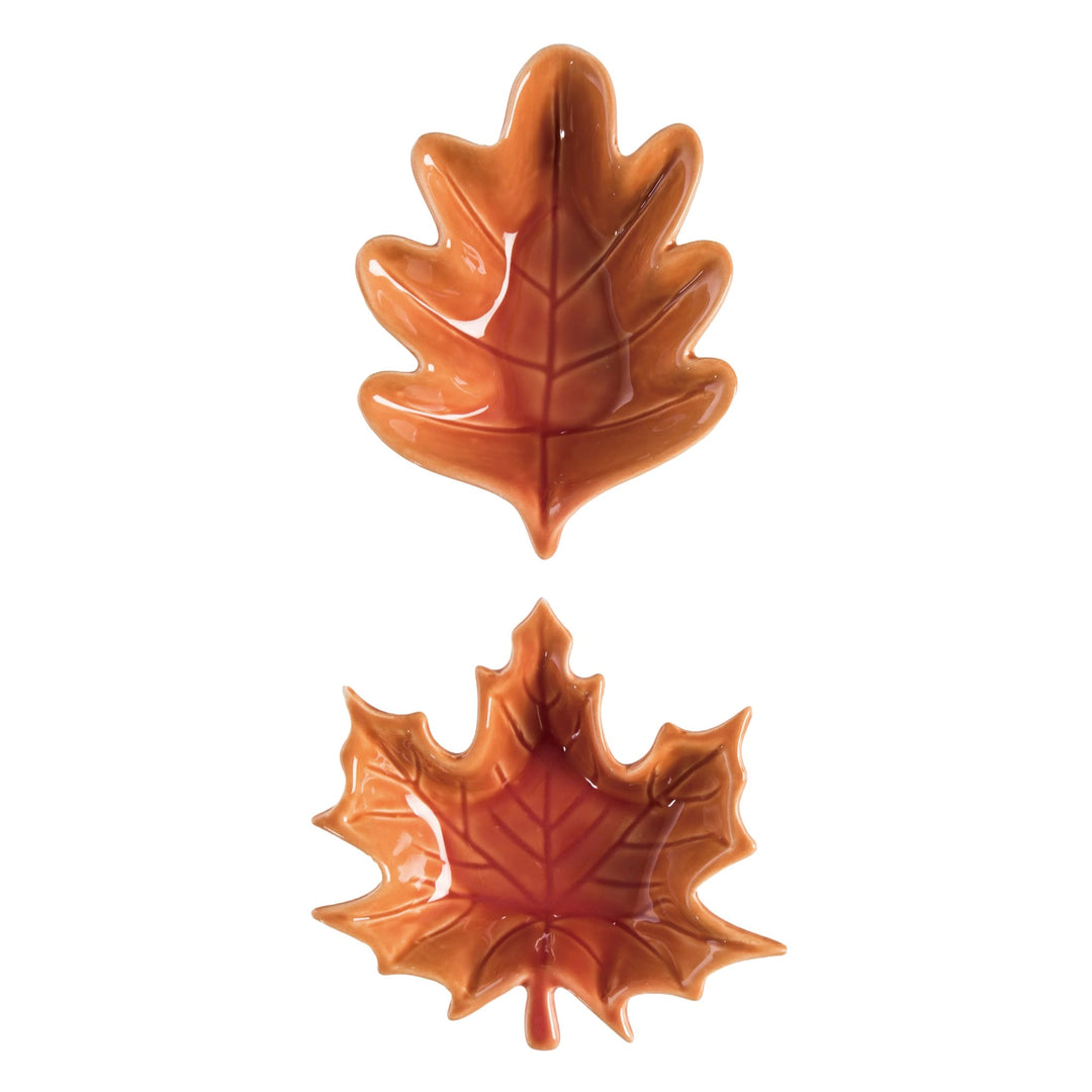 Two leaf-shaped bowls on a white background