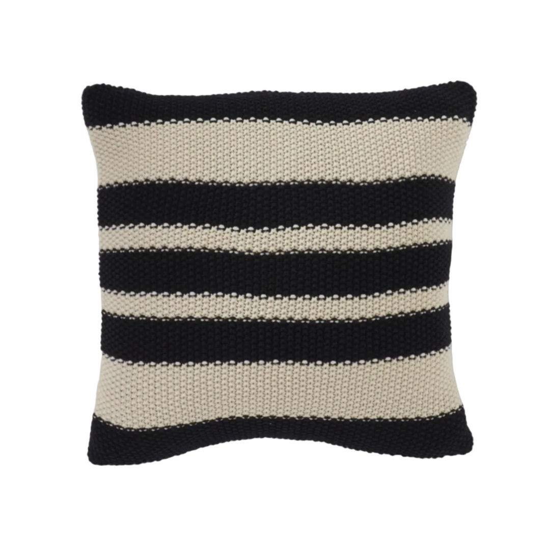 Striped pillow with black and beige pattern on a white background