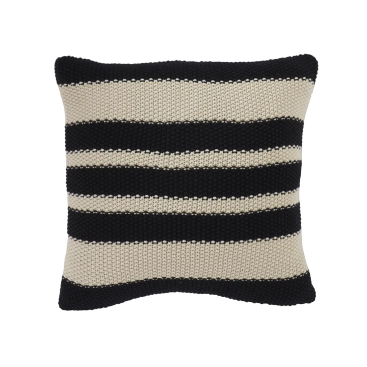 Striped pillow with black and beige pattern on a white background
