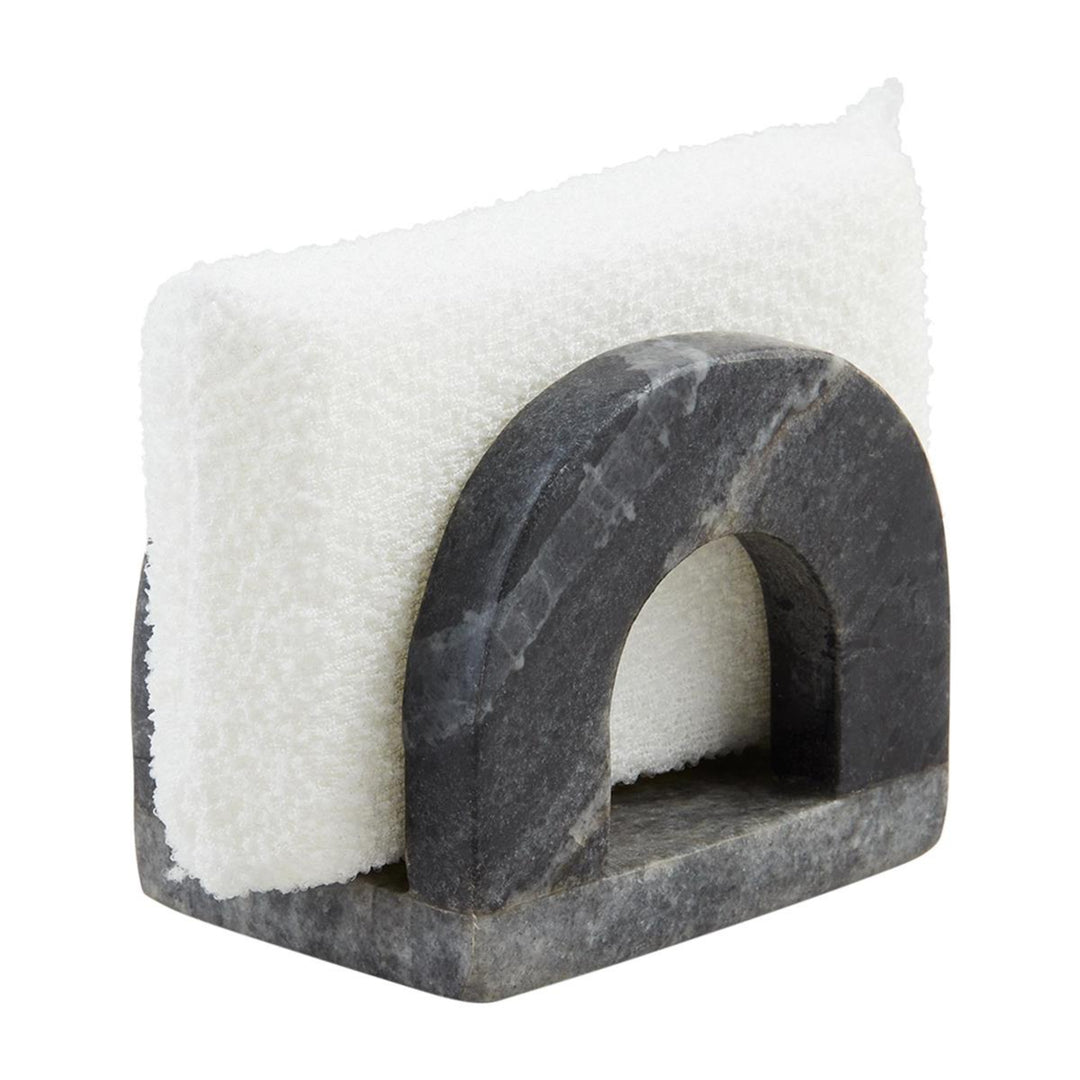 Cat house with white cushion and dark stone-like exterior on a white background