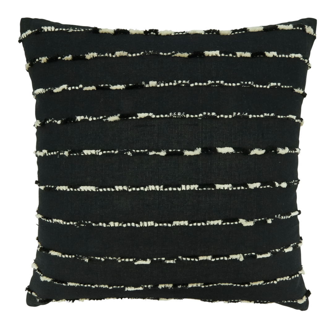 Black pillow with white abstract pattern on a white background