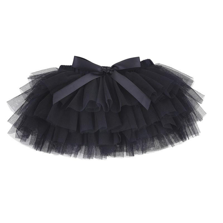 A black tiered tulle tutu skirt with a large matching black satin bow at the waist, displayed against a solid white background.