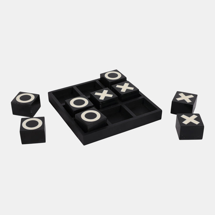 Tic-tac-toe game set with black cubes on a white background
