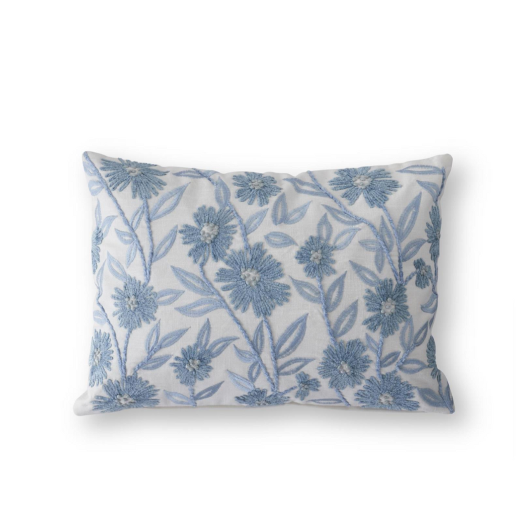 Floral patterned pillow on a white background
