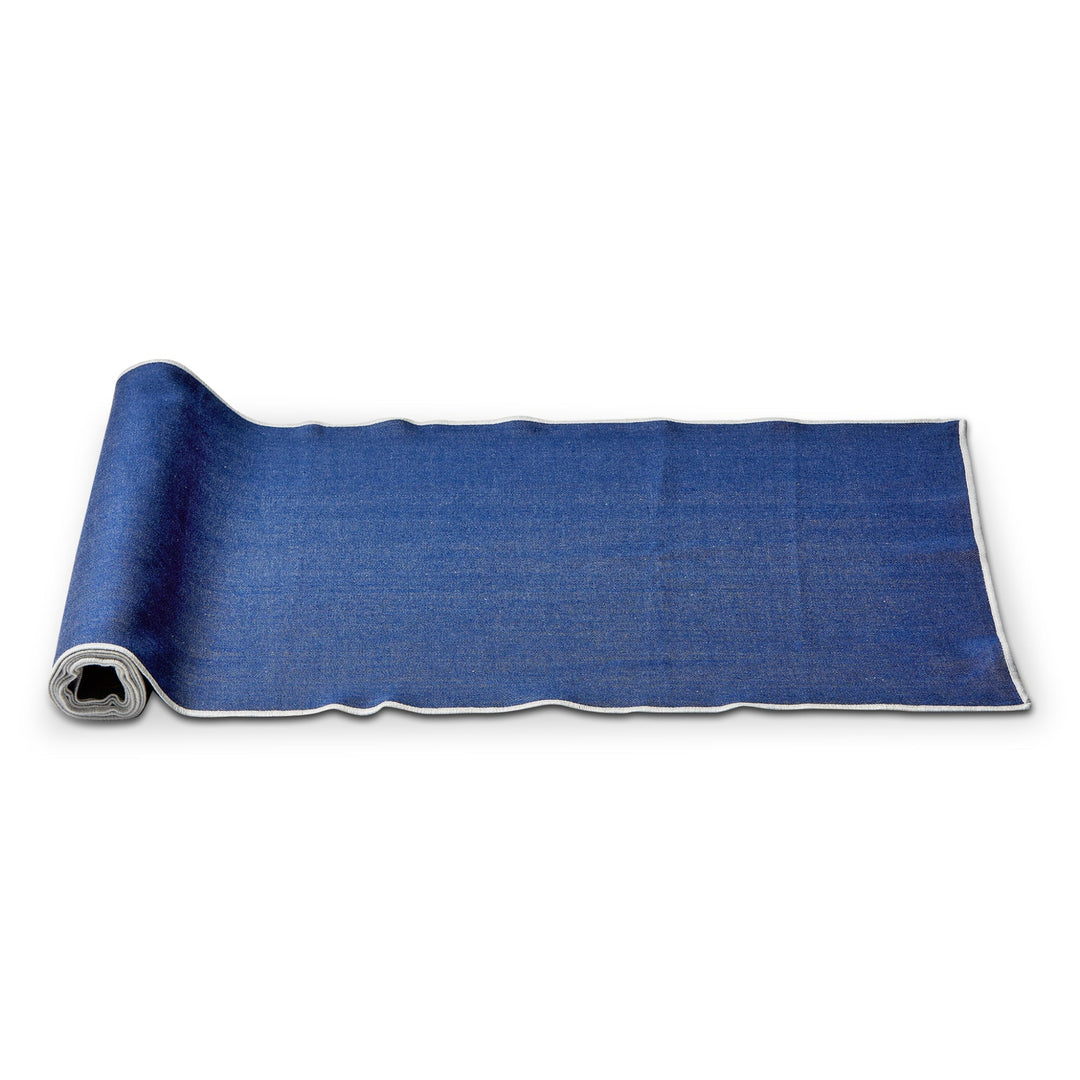 Rolled-up blue mat on a white background