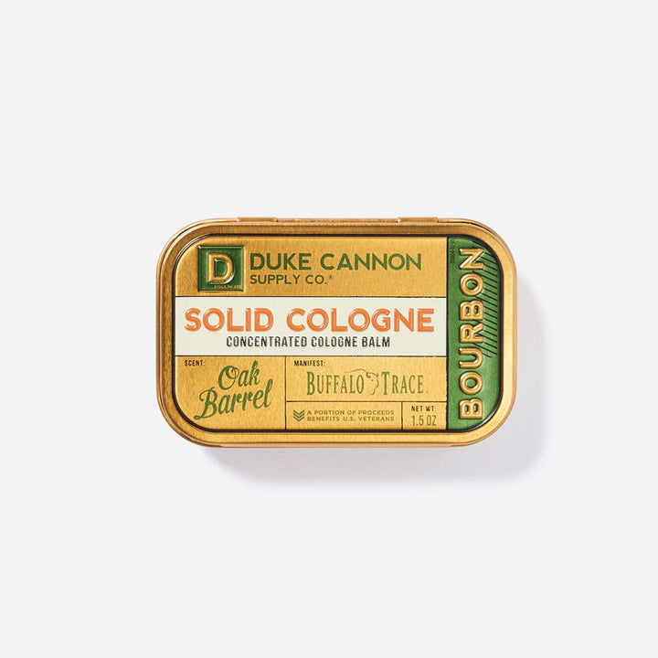 Duke Cannon Supply Co. solid cologne balm packaging on a white background