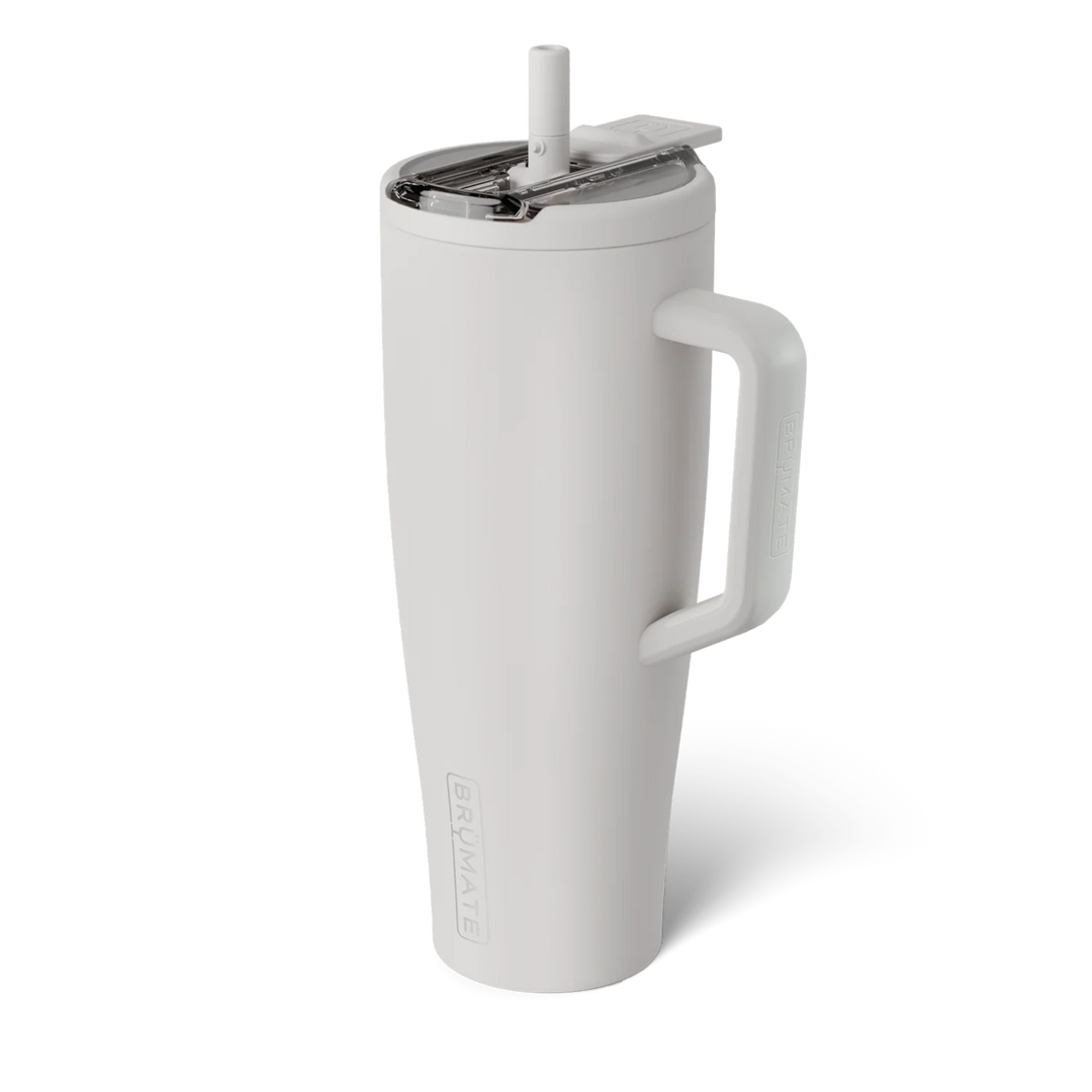 White insulated tumbler with handle and straw on a white background