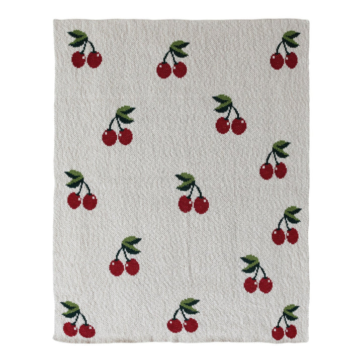 Textile with cherry pattern on a white background