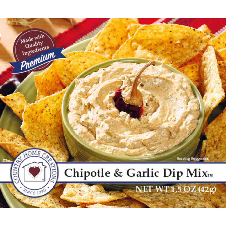 Bowl of chipotle and garlic dip mix with tortilla chips on a red background, featuring Country Home Creations branding.