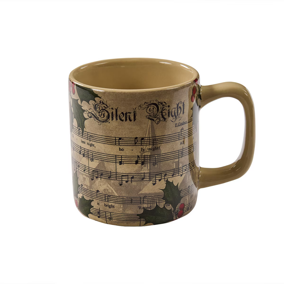 Mug with sheet music design and 'Silent Night' text on a white background