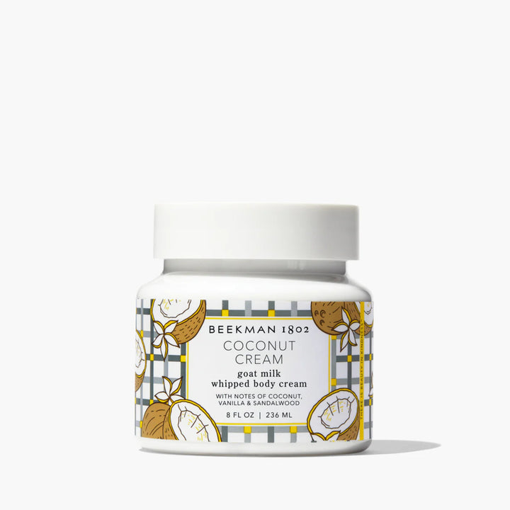Beekman 1802 coconut cream whipped body cream jar on a white background