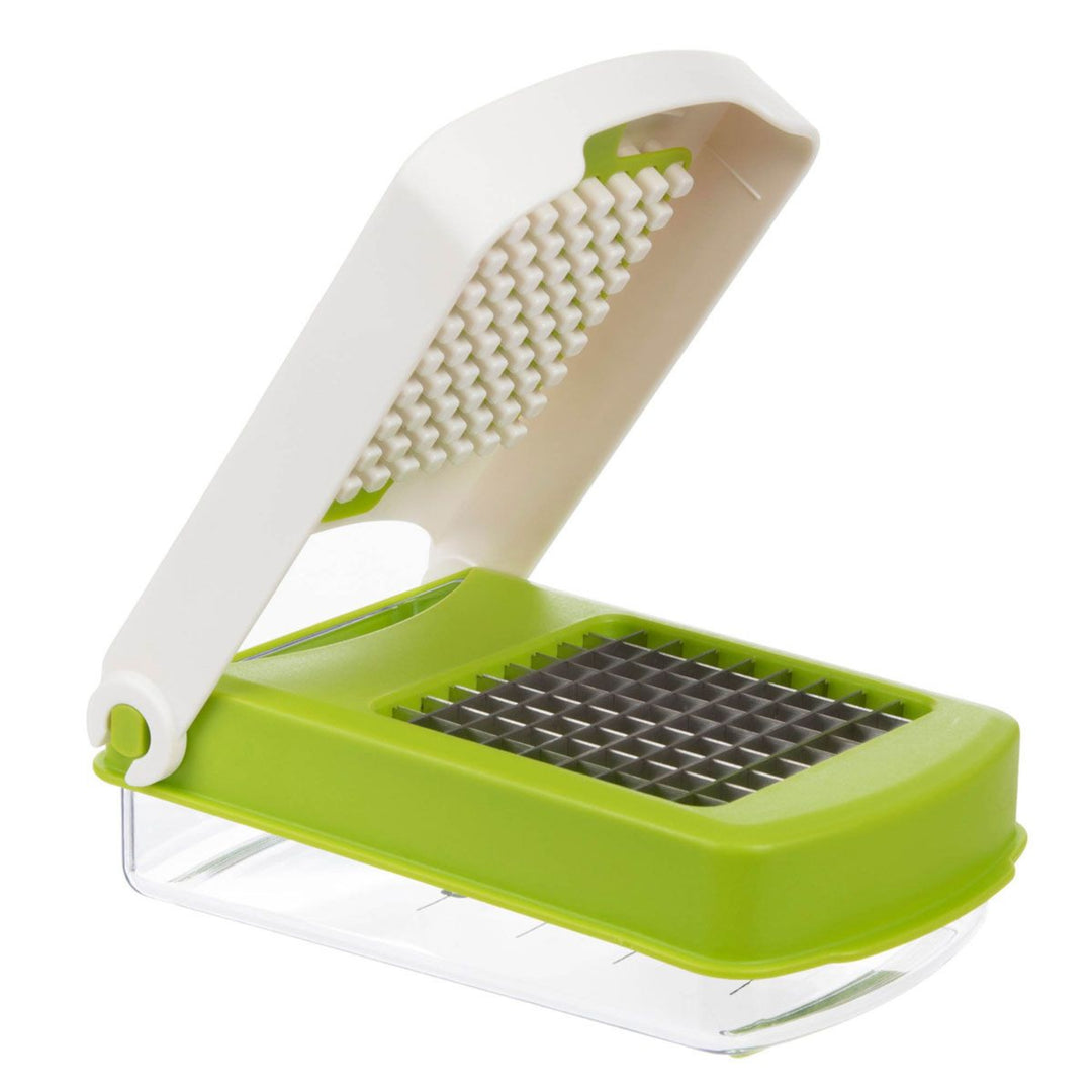 Green and white kitchen tool with a clear container on a white background