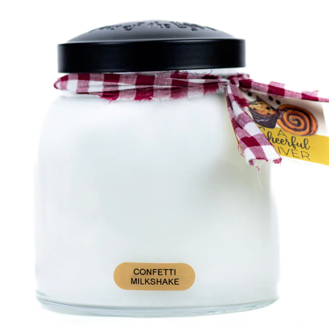 Jar candle labeled 'Confetti Milkshake' with a checkered ribbon and tag on a white background