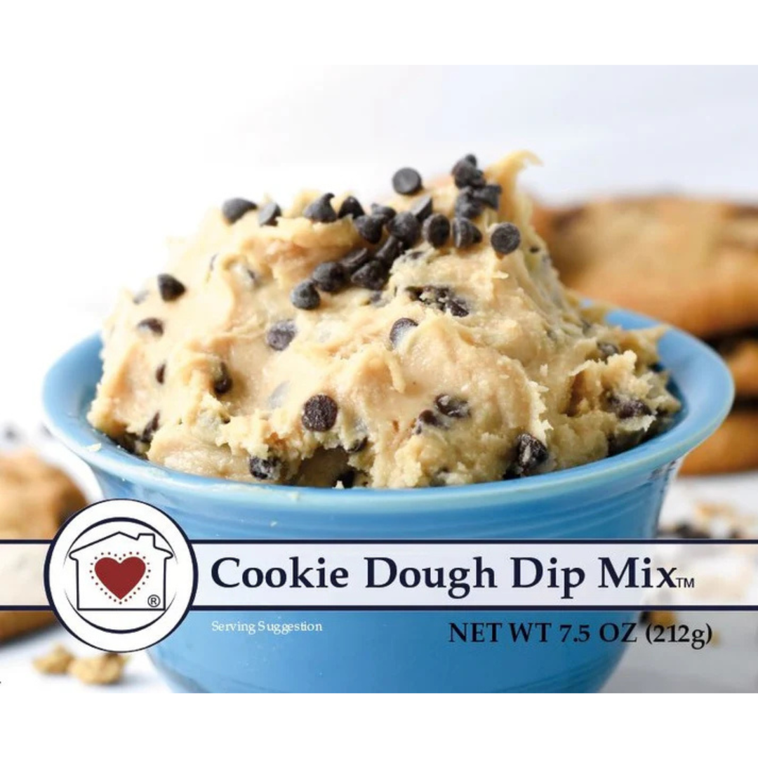 Cookie dough dip mix with chocolate chips in a blue bowl on a white background