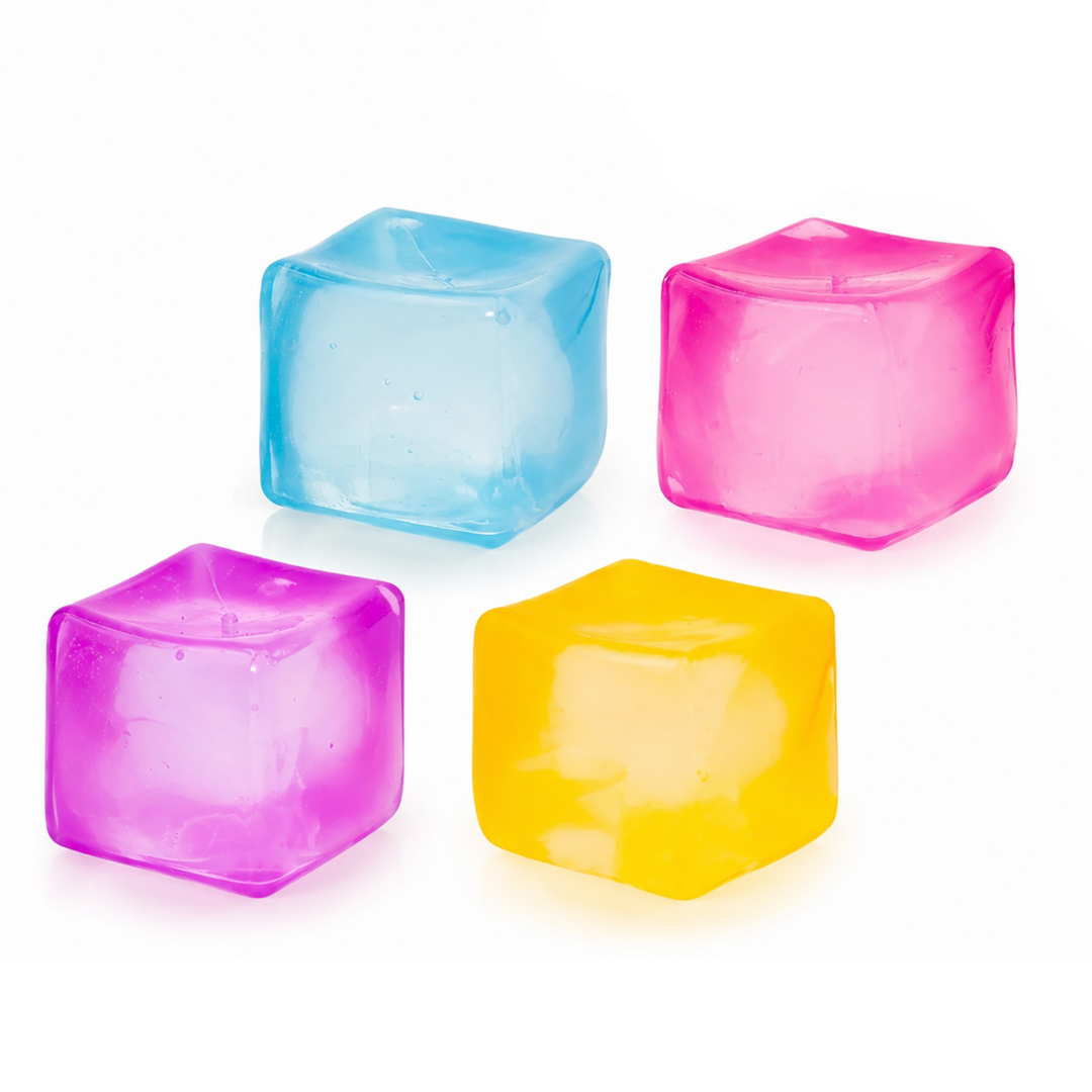 Colorful silicone ice cube trays on a white background