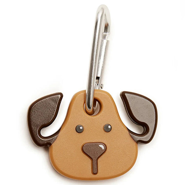 Dog-shaped keychain with a brown face and ears on a white background