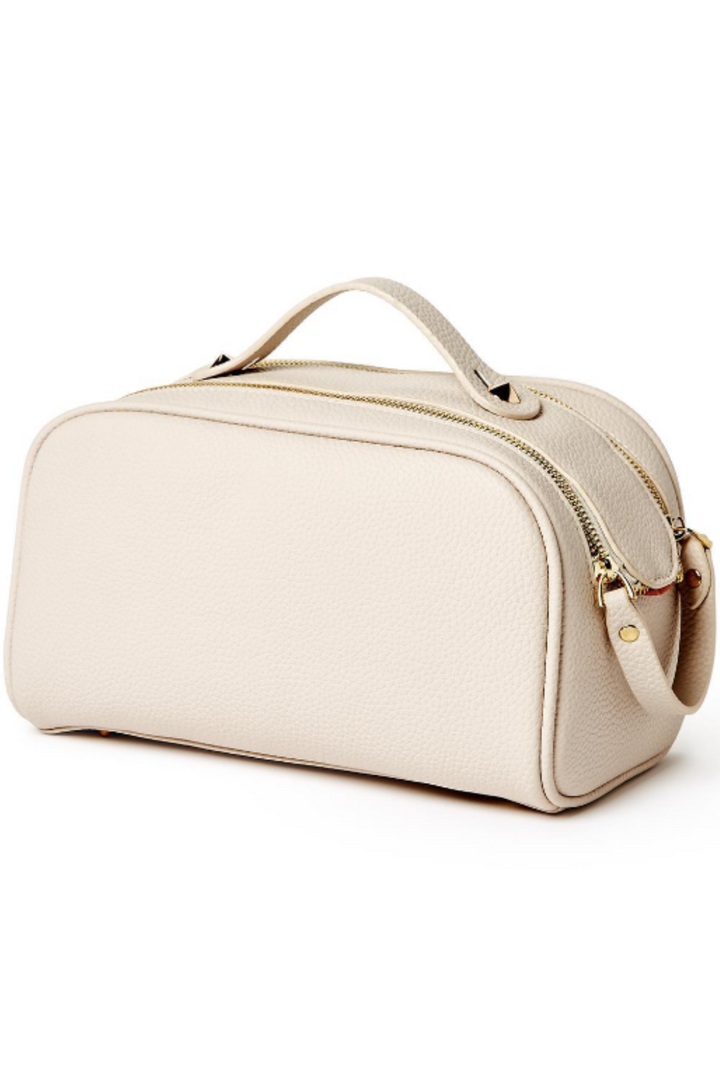 Beige handbag with gold accents on a white background