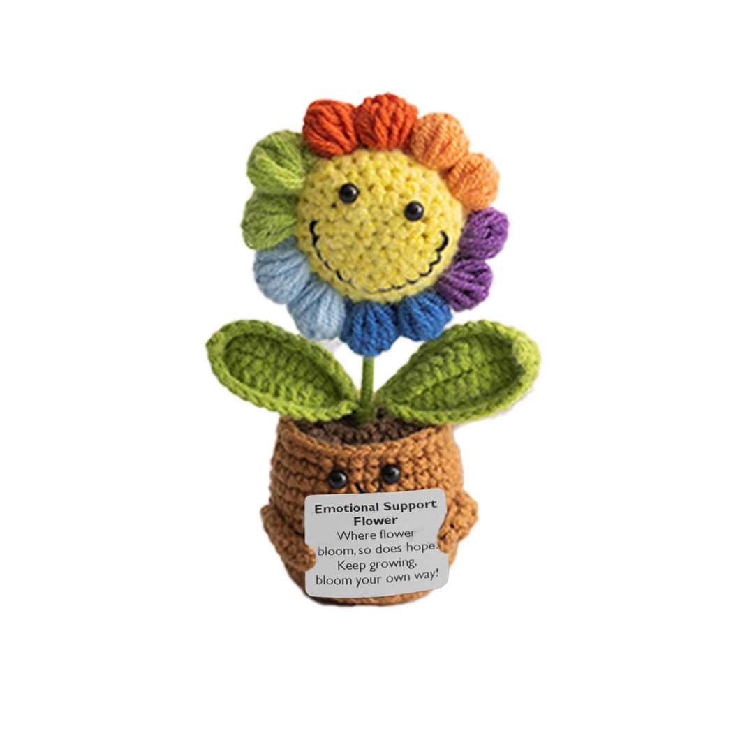 Three crocheted flower characters with pot and labels on a white background