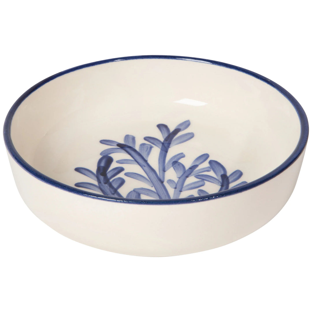 Ceramic bowl with blue floral design on a white background