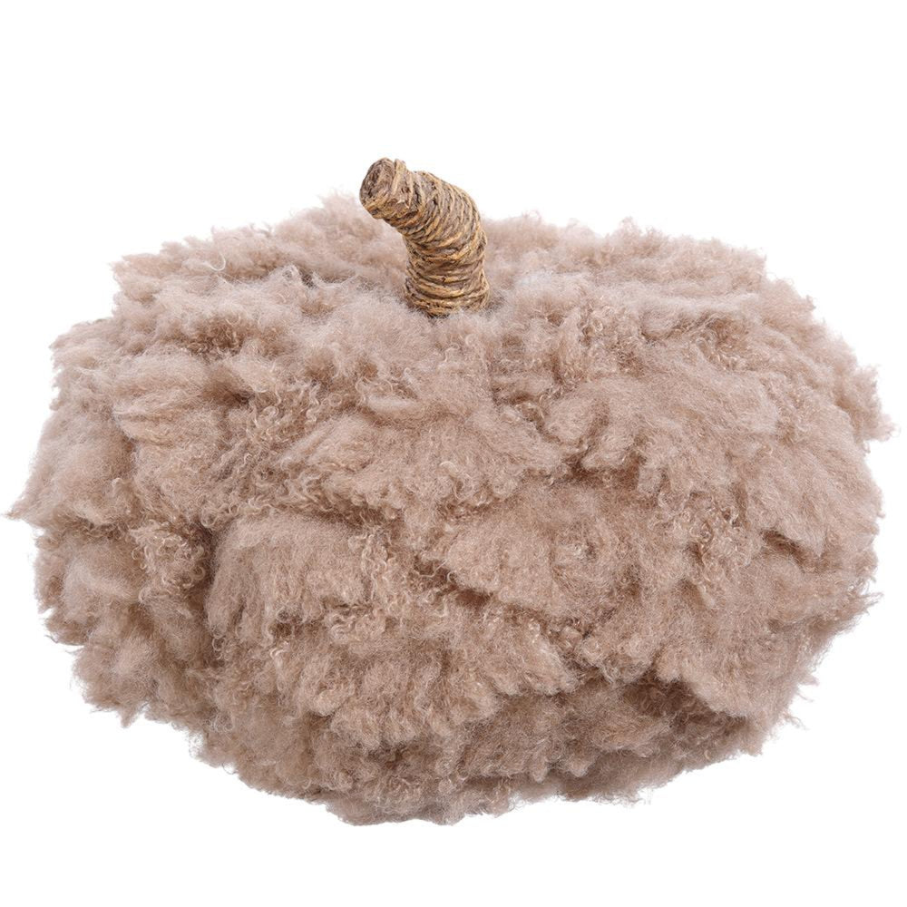 Fluffy beige pumpkin decoration on a white background