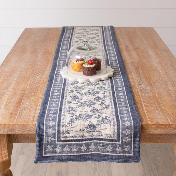 Table runner with floral pattern on a wooden table