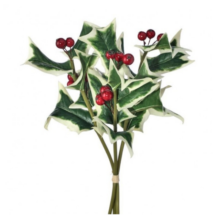 Artificial holly branch with variegated green and cream leaves and small glossy red berries, tied at the stem on a white background.