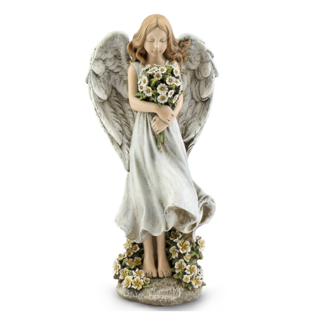 Angel figurine holding flowers on a white background