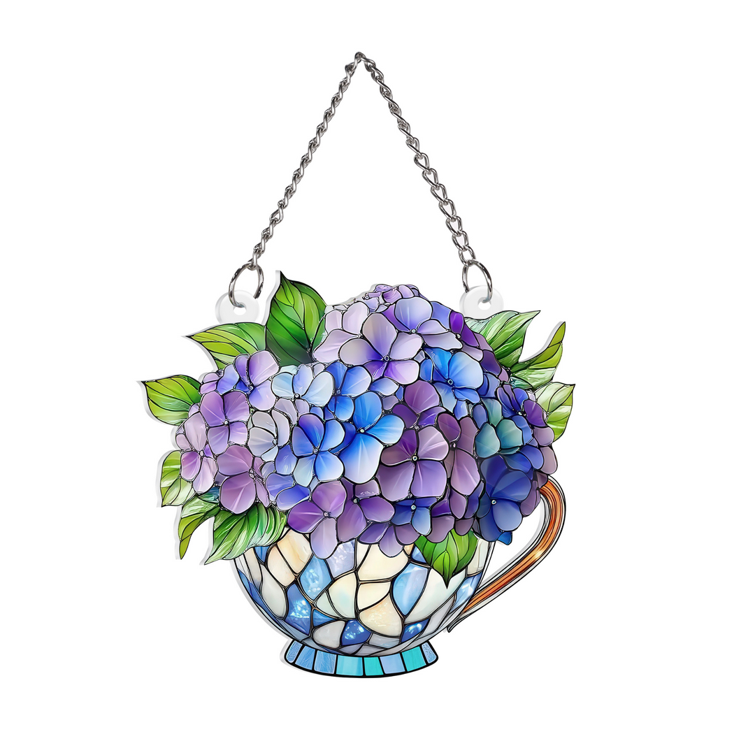 Decorative hanging planters with floral designs on a white background
