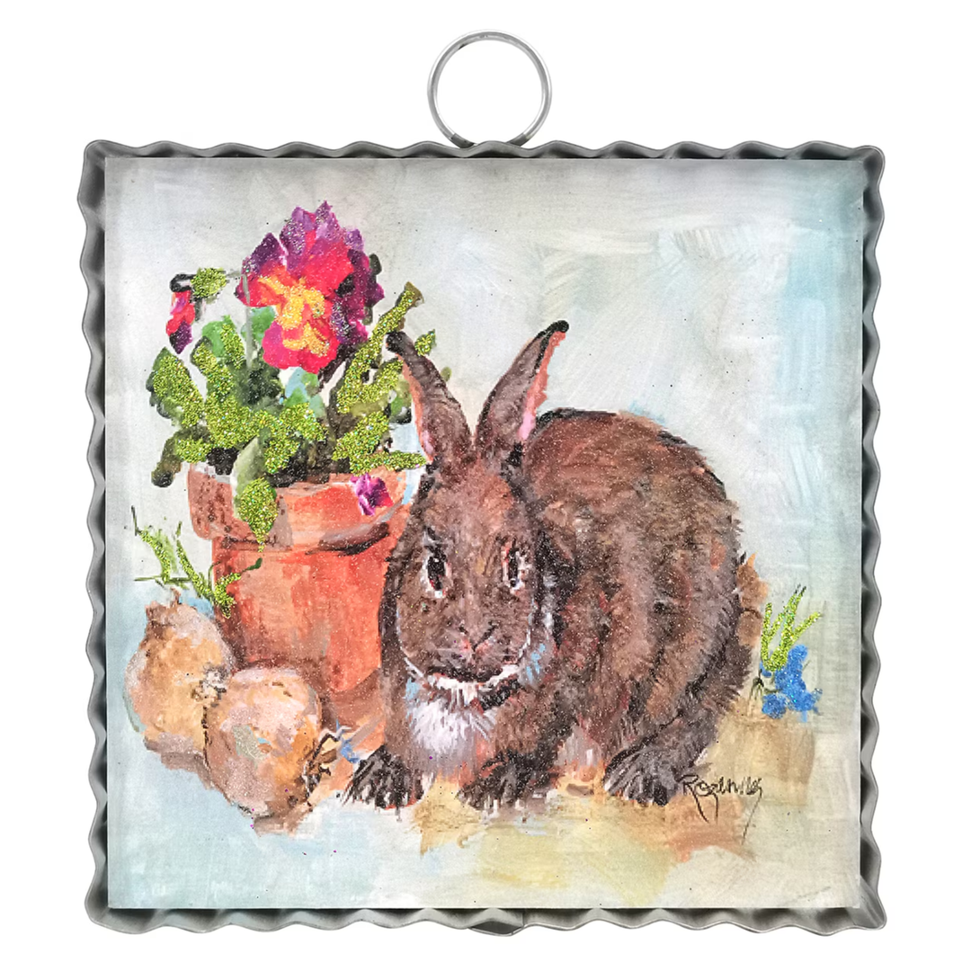 Decorative tile with a rabbit and flowers design on a white background