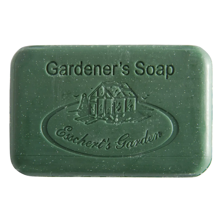 Green bar of soap with 'Gardener's Soap' and 'Eschert's Garden' branding on a white background