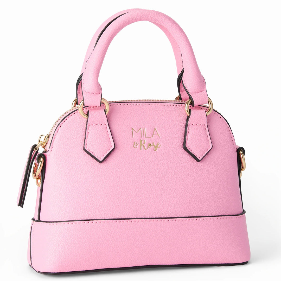 Pink handbag with gold accents on a white background