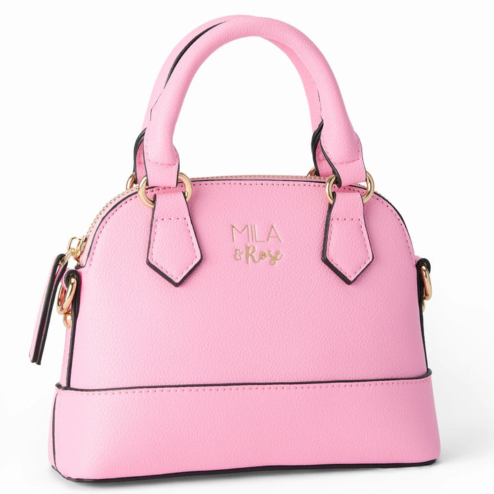 Pink handbag with gold accents on a white background