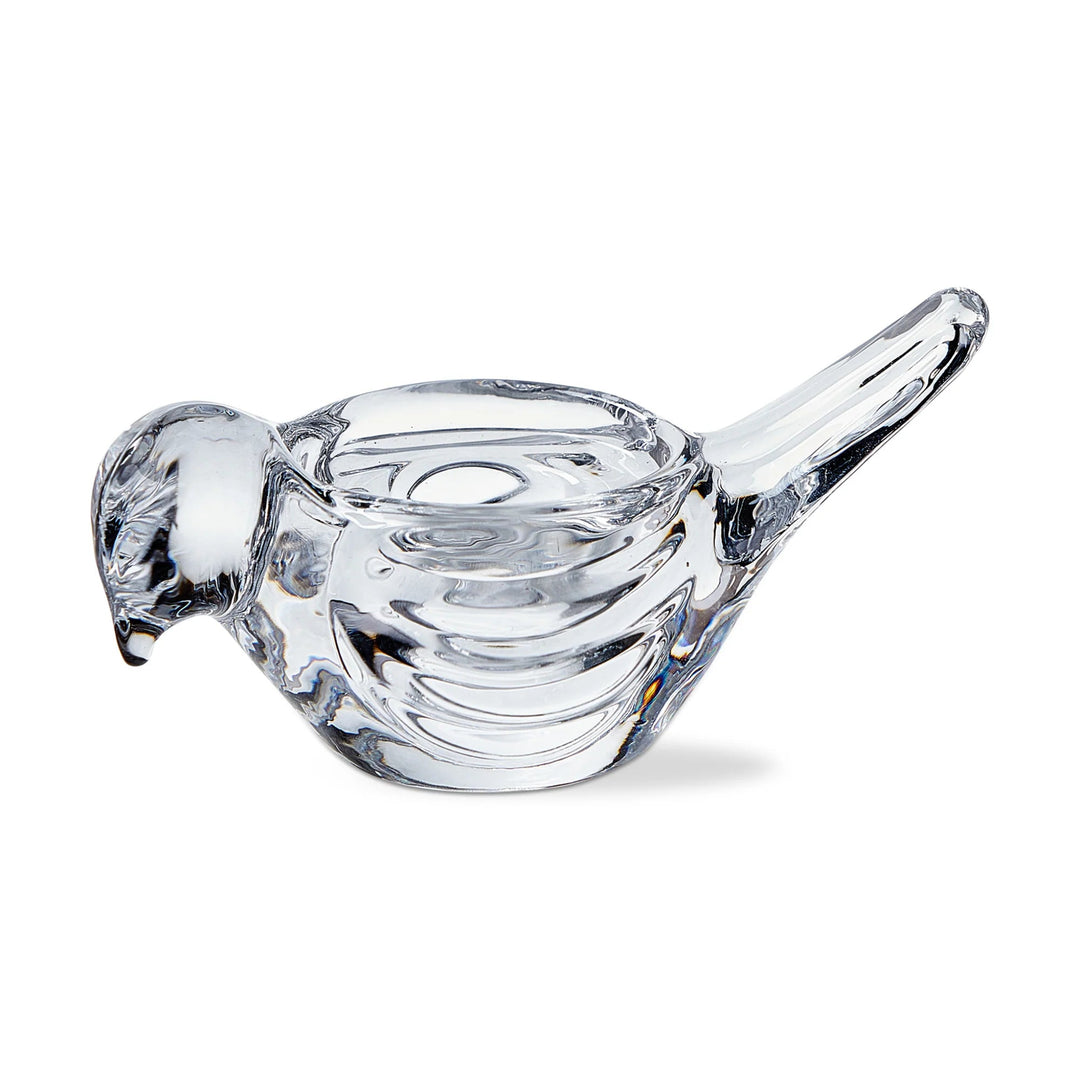 Clear glass bird-shaped object on a white background