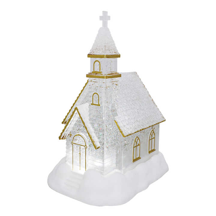 A small decorative church figurine with a textured white body, gold trim, and a white cross on top, shown on a plain white background.