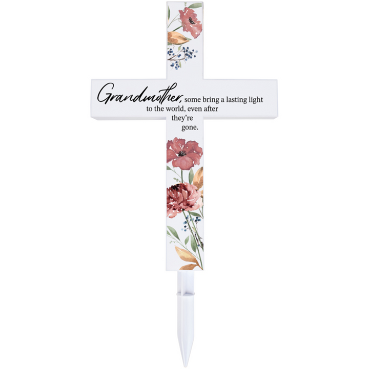 Decorative cross with floral design and text on a white background