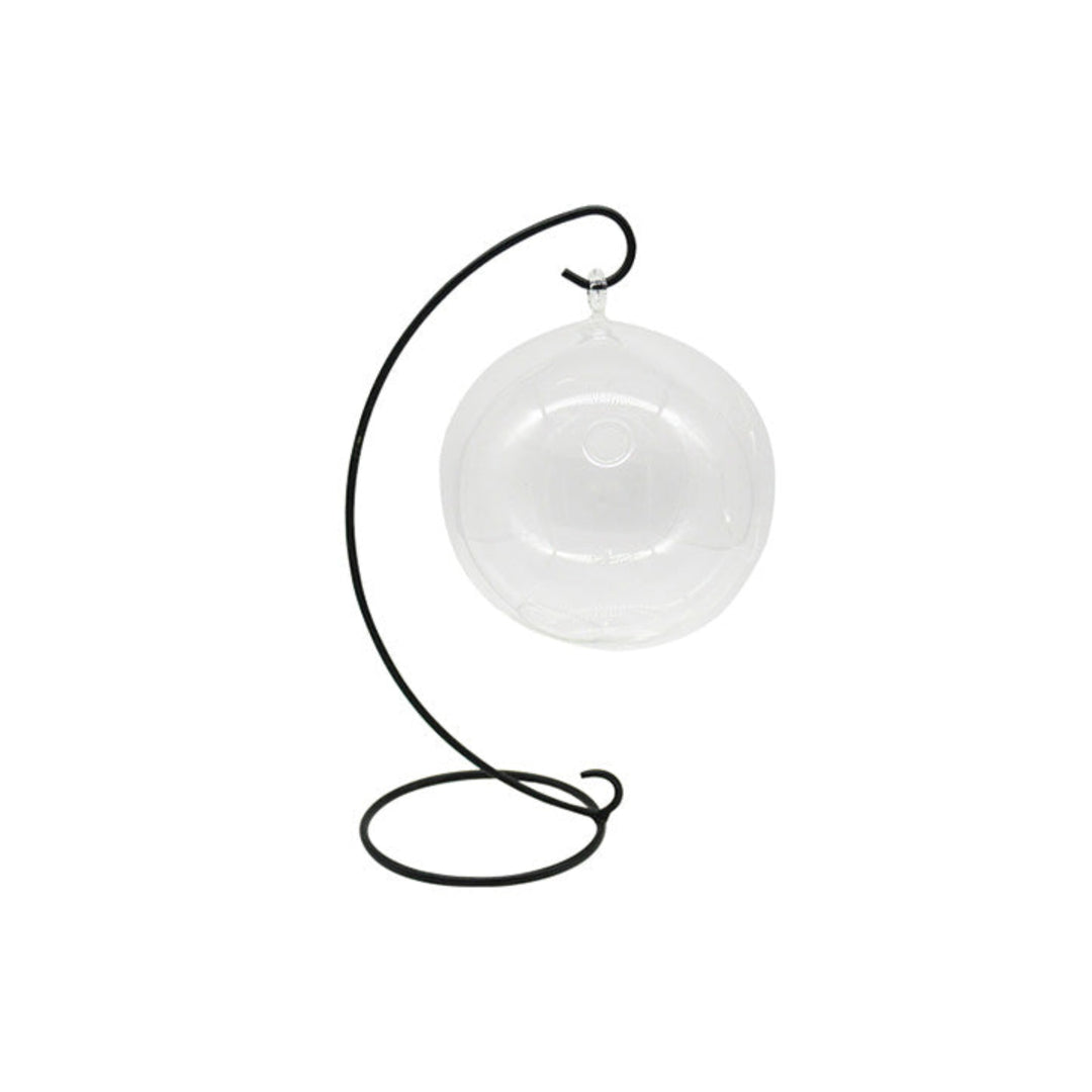 White hanging dish with black metal stand on a white background