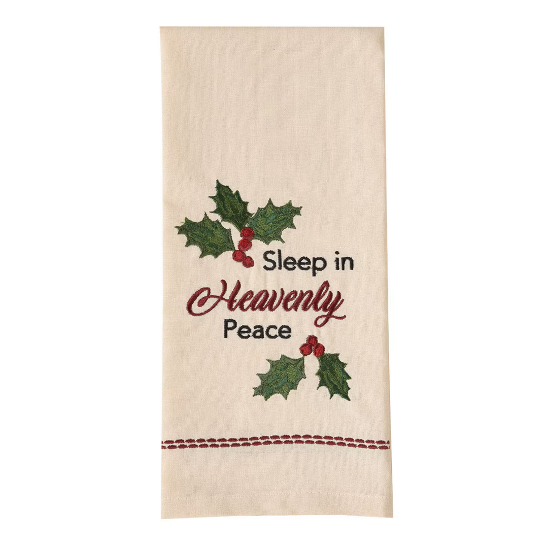 Decorative towel with holly design and text on a white background