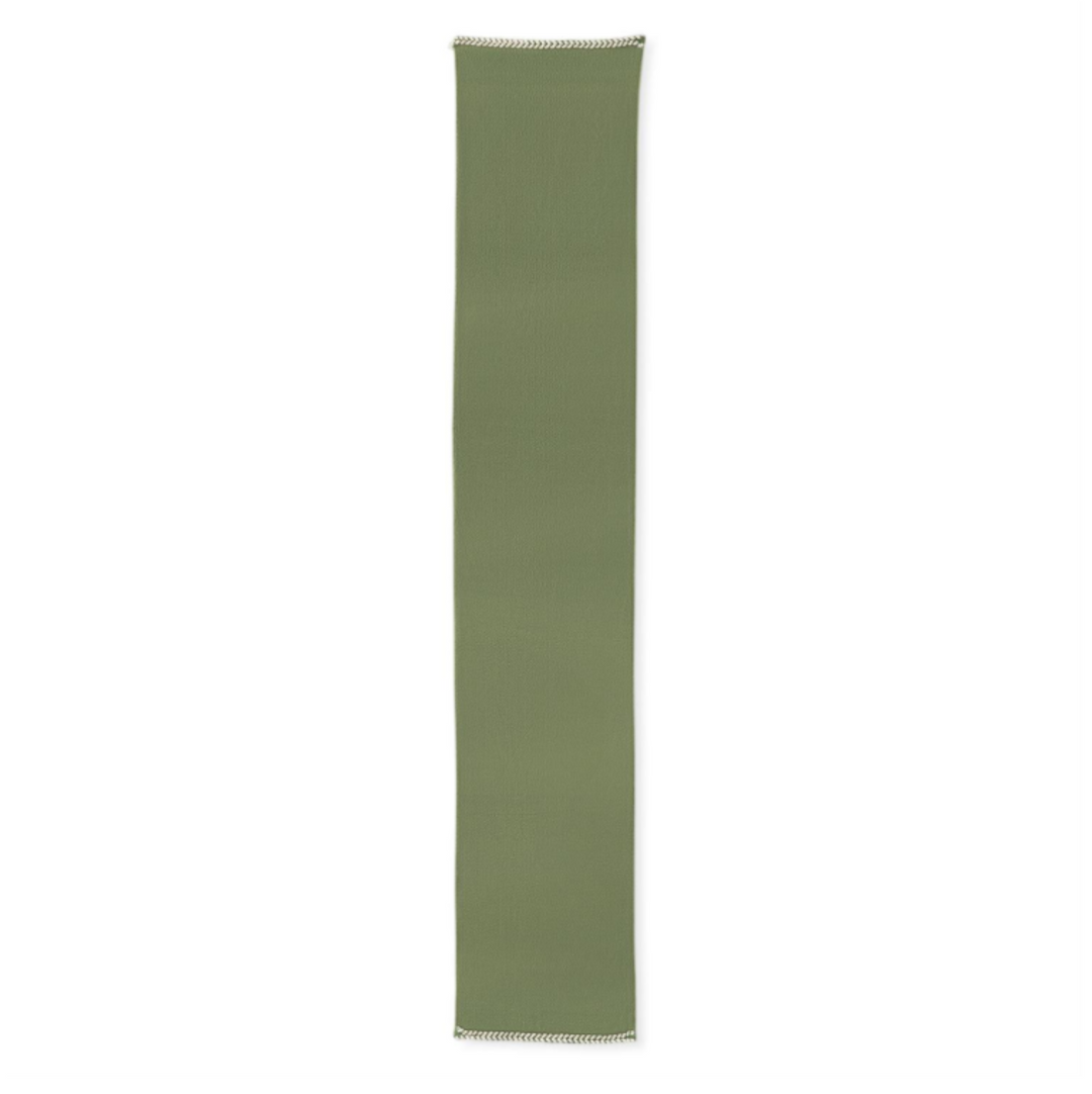 Green fabric strip on a white background